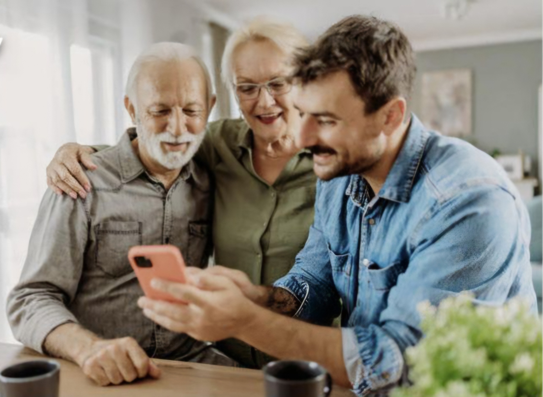 A family looking at Nijio together on a phone